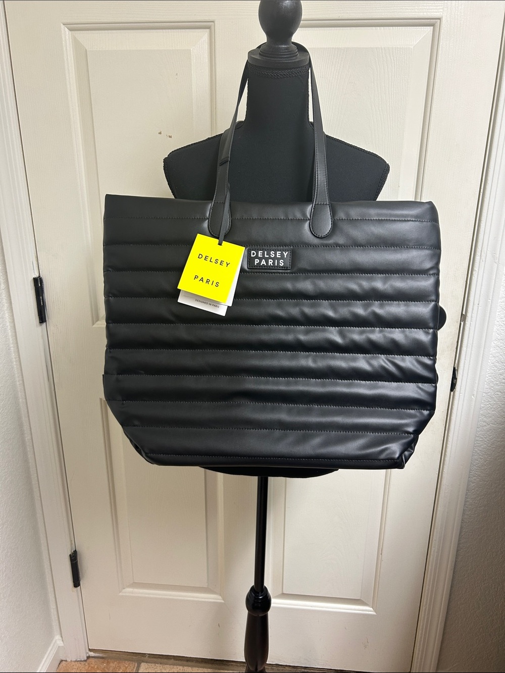 Delsey Paris, Cruise 3.0 black travel tote bag
puffy jacket-inspired tote, NWT
